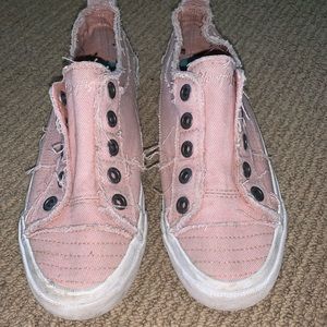 Pink distressed sneakers
